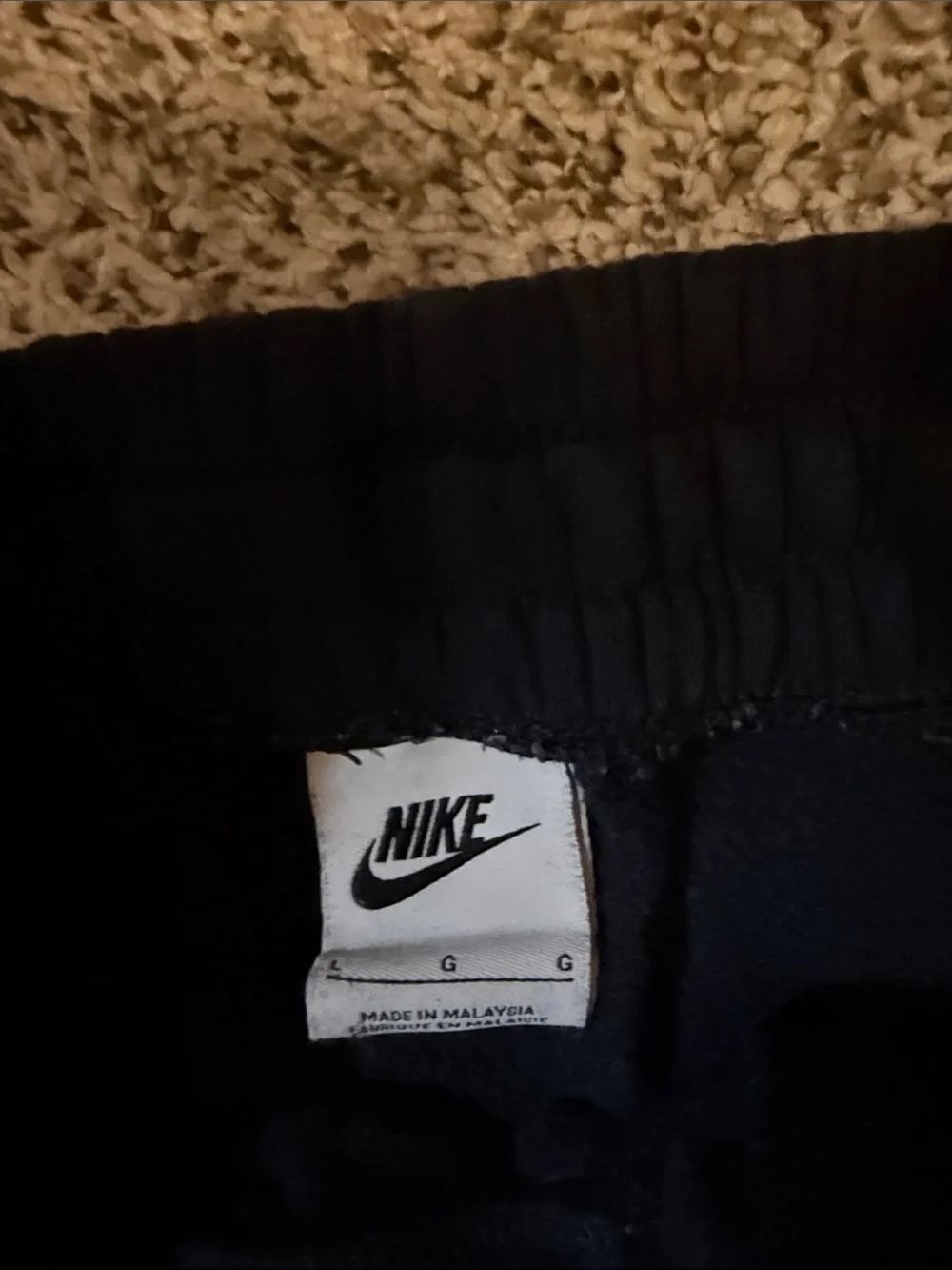 Nike Kids size L Black Jogger Sweatpants with White Swoosh